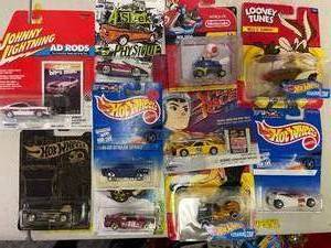 lot 265 image: 10 Random Hot wheel Cards and other brands (EXAMPLE SHOWN)
