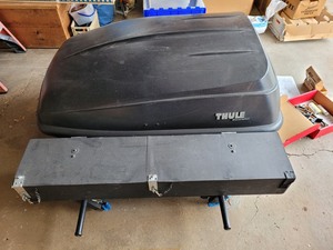 lot 109 image: Thule & Yakima Car Top Carrier with Fishing Rod Storage