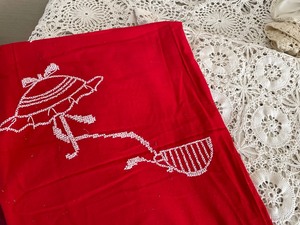 lot 331 image: Hand Crocheted Tablecloths, Hardanger embroidered pillow, Red Teacup x-stitched Table cover