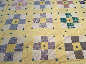 lot 10 image: Nine PatchCross Pattern Quilt yarn tied