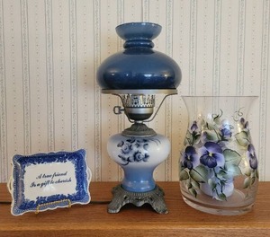 Blue lamp, floral painted vase, small plate