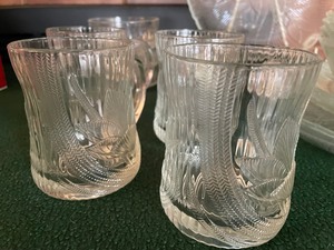 Set of four Clear Floral Glass Dishes