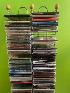 Collection of Spiritual CDs in stand with Player