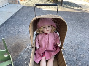 Vintage Baby Buggy with a Doll and Bed