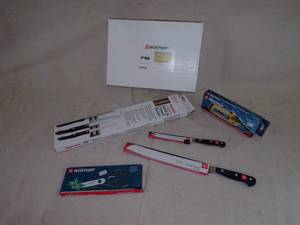 lot 118 image: Wusthof Knives and Cutting board