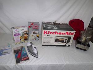 lot 120 image: Kitchen Aid Countertop Oven, Food Processor, Iron, Cherry Stoner, Cookie Press