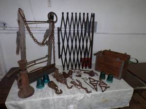 lot 169 image: Antique Pulleys, Glass Insulators, Antique Kids Gate, Antique Wood Truck with foldup Handles