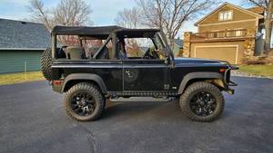 1995 Land Rover Defender 90 Soft Top Sports Utility 2D V8 with Safari Seats $87,100 Haggerty Valuation VIDEOS
