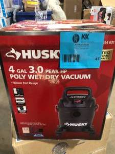 lot 47 image: Husky 4 Gal. Poly WetDry Vac with Filter, Hose, and Accessories    Customer Returns See Pictures