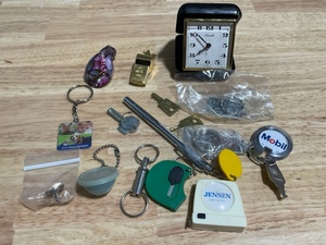 lot 19 image: Assorted Keychains and Travel Clock