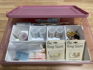 lot 52 image: Rubbermaid Container filled with Jewelry Parts