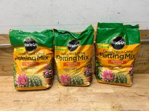 lot 66 image: MIRACLE GROW Lot of 3 Bags of- Cactus, Palm & Citrus Potting Mix (8 quarts per bag)
