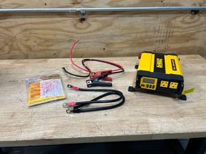 lot 71 image: DEWALT 1000-Watt Portable Car Power Inverter with Triple USB Ports