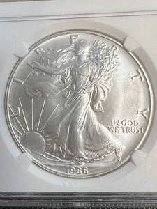 1986 AMERICAN SILVER EAGLE NGC MS69