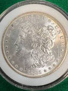 1885-O US MORGAN SILVER DOLLAR IN GREEN CASE