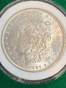 1884-O US MORGAN SILVER DOLLAR IN GREEN CASE