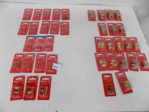 lot 208 image: 39 - Packs Compression Sleeves, Nuts