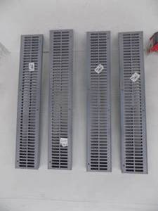 lot 244 image: 4 - 2 foot x 4  Channel Grate
