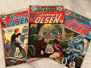 lot 157 image: A lot of three Jimmy Olsen Comics.