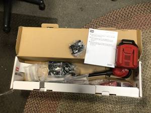 lot 17 image: Toro 60V MAX 13 in. (33.0 cm)  15 in. (38.1 cm) Brushless String Trimmer with 2.0Ah Battery Customer Returns See Pictures