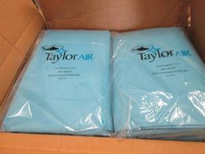 lot 78 image: Case of 24 Taylor Air SureFit Imper...