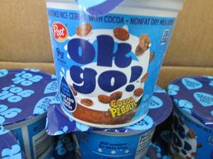 lot 374 image: Case of 12- 2.2 oz Cocoa Pebbles OK...