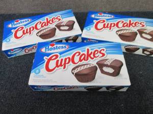 lot 394 image: 3- 12.7 oz Boxes Hostess Cupcakes...
