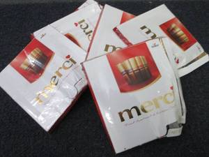 lot 435 image: 6- 7 oz Merci Chocolates...