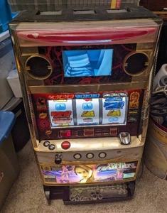 lot 5 image: Tomb Raider Token Coin Game Slot Machine