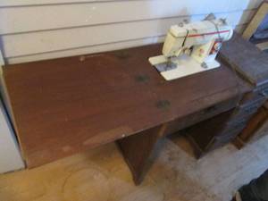 New Home Vintage Sewing Machine encased in Wooden desk style work station