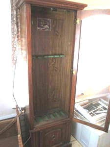Taller 6-space Gun cabinet with glass front door and lower storage cupboard