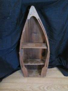 Beautifully crafted Wooden Canoe Shaped shelf approximately 20 tall
