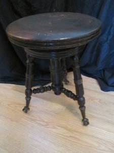 Vintage Dark tone Wood clawfoot Swiveling stool