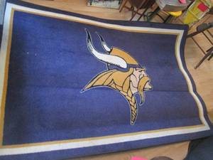 Large Vikings football themed area rug