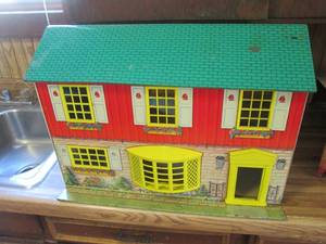 Antique Tin Dollhouse with compartmentalized rooms (missing the front door)