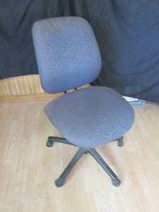 Cushioned and Upholstered rolling office chair