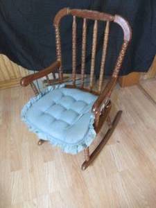 Childs size wooden rocking chair with removable seat cushion