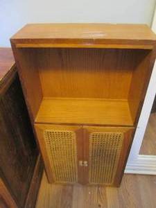 Petite wooden storage cabinet with Wicker Rattan door fronts