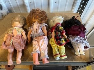 4 old dolls
