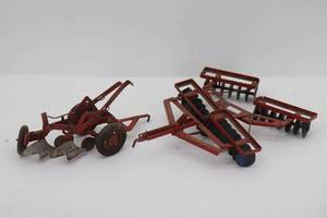 lot 127 image: McCormick-Deering Metal Farm Toys