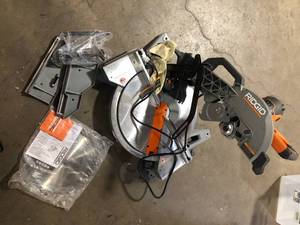 RIDGID 15 Amp Corded 12 in. Dual Bevel Miter Saw with LED Cutline Indicator  Customer Returns See Pictures
