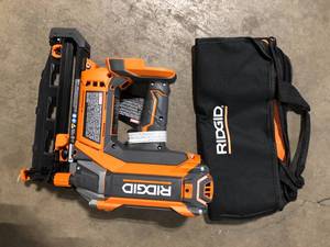 RIDGID 18V Brushless Cordless HYPERDRIVE 16-Gauge 2-12 in. Straight Finish Nailer(Tool Only), Belt Clip, Bag, Sample Nails   Customer Returns See Pictures