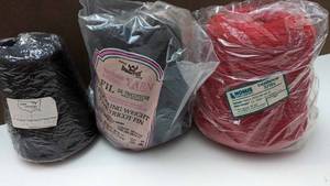 lot 29 image: Two Skeins Of Yarn Country Black Yarn-One Skein Of Nomis Yarn Country Red Yarn