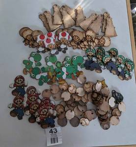 lot 43 image: Lot Filled With Laser Cut Super Mario Brothers Ornaments