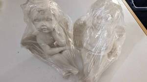 lot 79 image: Two Collectible Cherub Dolls