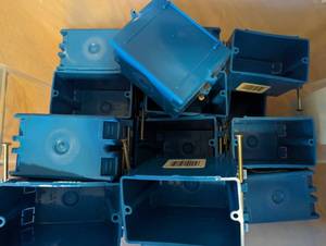 lot 148 image: Bin Filled With Blue Outlet Boxes
