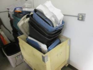 lot 30 image: Multitude of empty storage totes, some lids as well as a wooden storage box