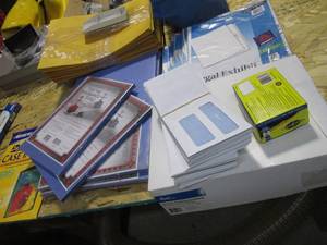 lot 38 image: Large office supply lot of construction paper, envelopes, tabbed exhibit dividers and more