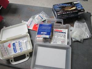lot 71 image: First aid kit and diamond grip powder free latex exam gloves