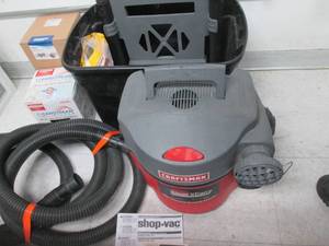 lot 74 image: Craftsman shop vac with hoses, accessories, bags and replacement filters